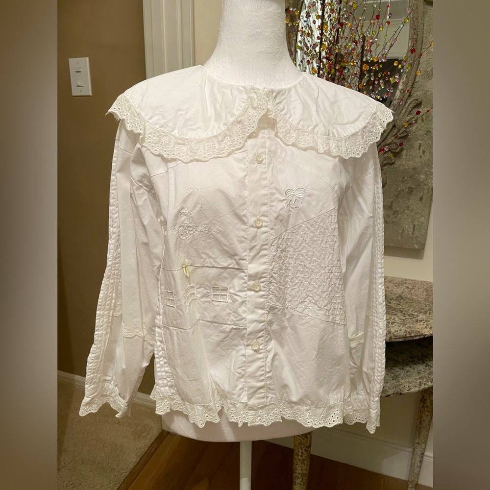 Kina + Tam white blouse.